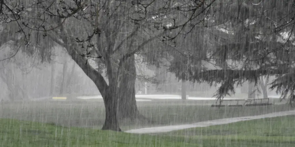 raining hard on a golf course